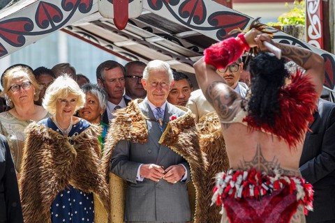 Wearing Maori cloaks, Prince Charles, Prince of Wales and Camilla, Duchess of Cornwall receive a