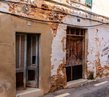 Detail photo, house facades of the historic houses in the old town of Alcudia, Majorca, Spain