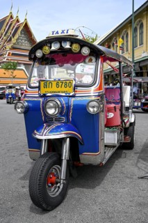 Tuktuk taxi in front of Wat Pho, Temple of the Reclining Buddha, Bangkok, Thailand