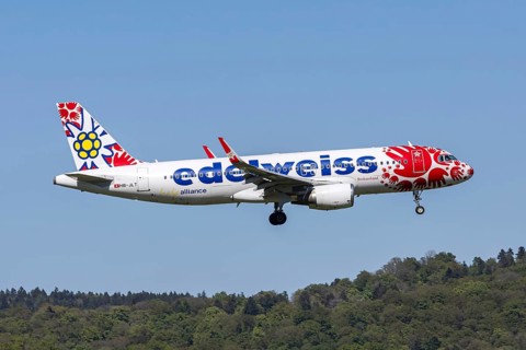 An Edelweiss Airbus A320 aircraft with the HB-JLT license plate and the Help Alliance special