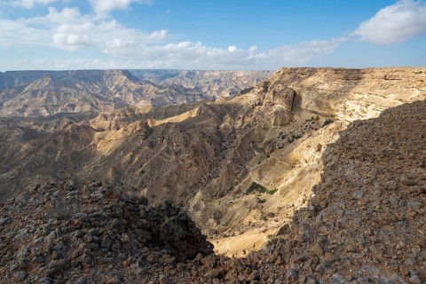 Barren mountains and gorges near Ash Shuwaymiyah, Oman