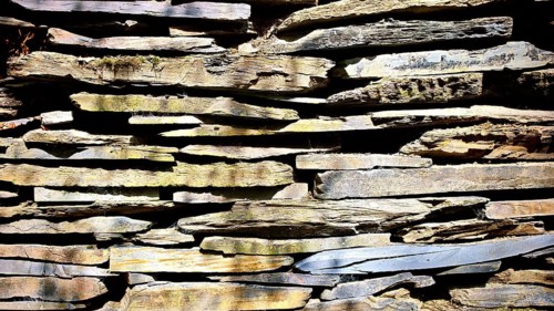 Close-up of a stone wall stacked from slate plates, Lehesten slate park, Rennsteig, Thuringian