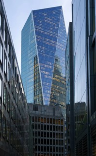 Lights at evening in skyscrapers high-rise office blocks financial district of City of London,