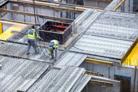 Construction site, installation of semi-precast floor slabs, which are then filled with in-situ