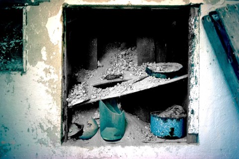 Destroyed houses, remains of the 1956 earthquake in the village of Oia, Santorini, Cyclades, Greece