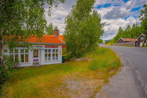 View along a street of an old gas station, Nedre Eggedal, Buskerud