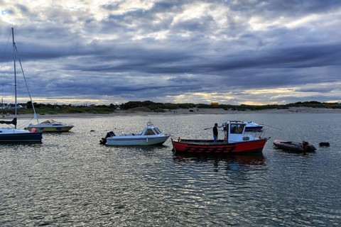 Carne Pier, fishermen, fishing boats at dusk, Carne Beach, Wexford, Gerrans Bay, Roseland