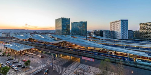 View of Vienna Central Station and various skyscrapers at dusk, 10th district, Vienna, Austria