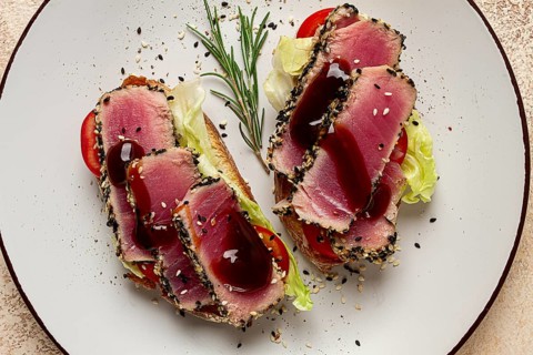 Sandwiches with fried tuna fillet, sesame, breakfast, top view, homemade