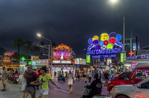 Crowds of people on Bangla Street in the evening. Nightlife on Bangla Walking Street with go-go