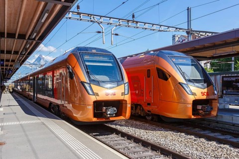 Railway passenger trains of the type Stadler Flirt of the Südostbahn at Arth-Goldau station,