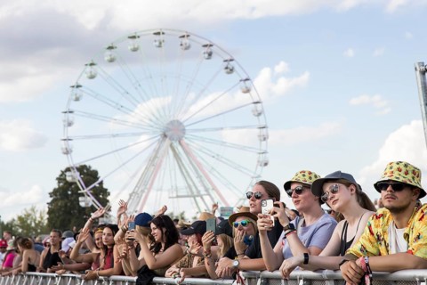 Festival visitors in front of the Ferris wheel at the Highfield Festival on Saturday, Störmthaler