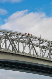 People walking on top of Harbor Bridge, Auckland, North Island, New Zealand