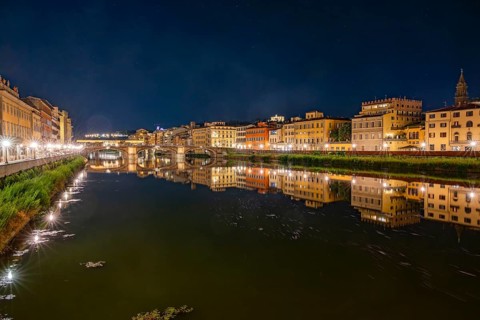 Promenade with arno river in front at blue hour, Florence, UNESCO World Heritage Site, Tuscany,
