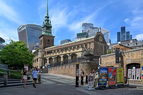 All Hallows-by-the-Tower church in front of the skyscrapers of the Broadgate district, banking