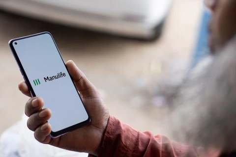 Manulife logo is displayed on smartphone. Manulife Financial Corporatipon is a Canadian