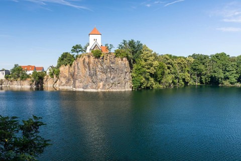 Kirchbruch lake and mountain church with water tower, Beucha, Leipzig district, Saxony, Germany
