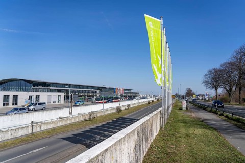 Dortmund Airport, flags in front of the terminal building, DTM, North Rhine-Westphalia, Germany