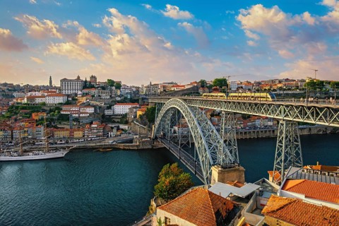 View of Porto city and Douro river and Dom Luis bridge I with tram from famous tourist viewpoint