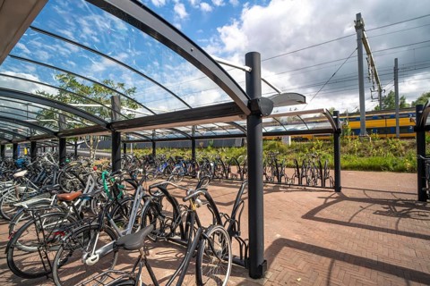 Bicycle parking spaces and boxes on the cycle path in the east of Utrecht, at Utrecht-Lunetten