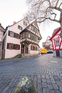 Snow-covered half-timbered houses on a cobbled street, Sindelfingen, Böblingen district, Germany