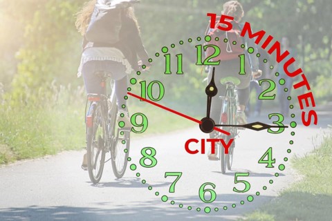 Symbolic image 15-minute city: Cyclist on a cycle path in the countryside and a clock showing