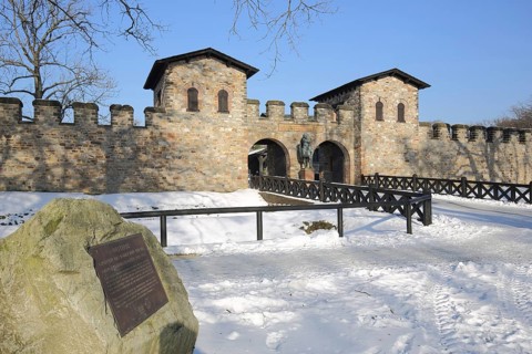 Roman UNESCO fort Saalburg in winter with snow, portal with towers, Upper Germanic Rhaetian Limes,