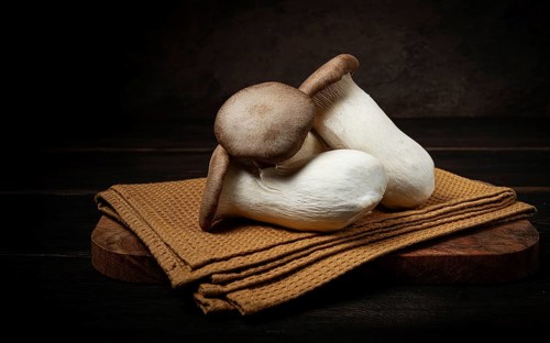 Fresh eringi mushrooms, raw, royal oyster mushrooms, three pieces, Asian cuisine, no people