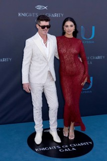 Cannes, France - 22.5.2024: Robin Thicke and April Love Geary at the Knights of Charity Gala at