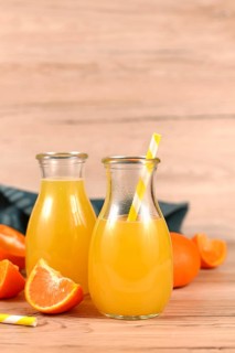 Homemade lemonade made from citrus fruits in jars