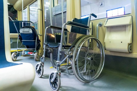 A wheelchair is parked in a bus