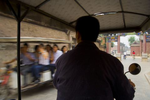 A Man Riding a Motor