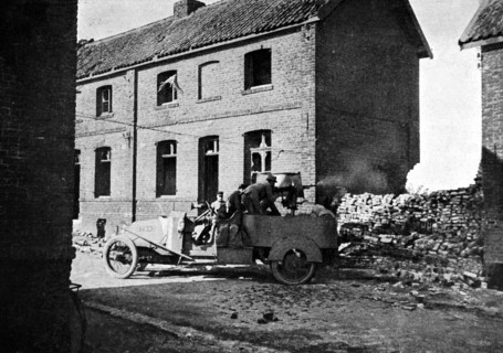 Hotchkiss armored car in position in a mining village