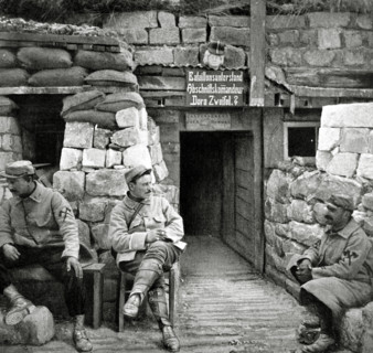 French firemen in front of a German underground post in Carency