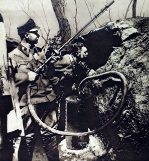 Austrian soldiers on the eastern front preparing to throw burning liquids