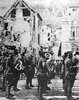 World War I. American military band giving a concert in the ruins of Château-Thierry