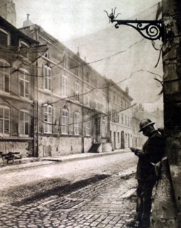 World War I. A camouflaged street in a village near the front