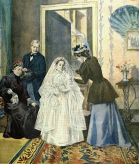 A young girl about to make her first communion getting dressed (1894)