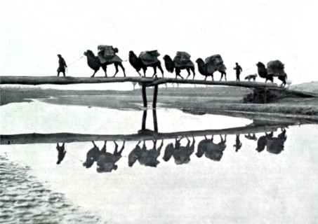 In Chinese Turkistan, crossing a river after the sands of Takla-Makane (1930)