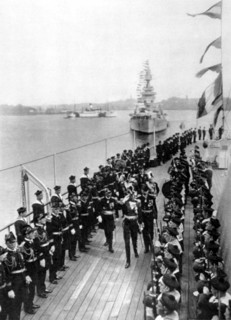 King Gustav V of Sweden inspecting the troops of battlecruiser Duquesnes in Stockholm (1930)