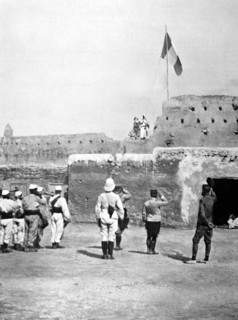 Salute to the French flag before the Aioun Sidi Mellouk Kasbah, in Morocco (1910)