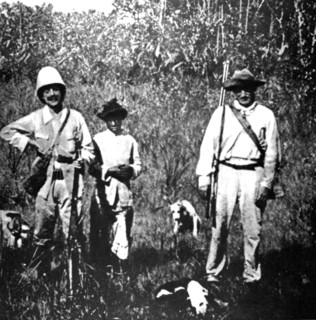 In French Guiana, guards and their dogs chasing escaped prisoners (1930)