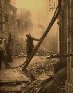 World War I. 
In Verdun, firemen fighting fires started by incendiary shells (1916)