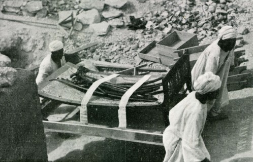 Tutankhamen's treasure, a bed is being taken out (1923)