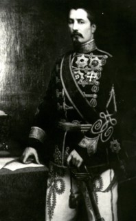 Cuza, Alexander John