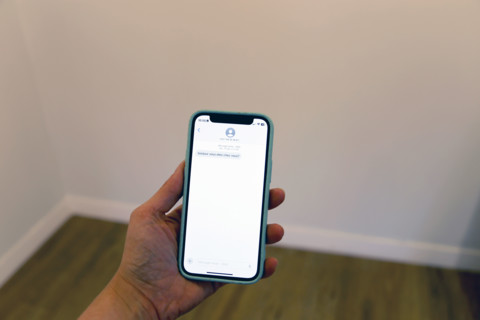 Hand holding a telephone