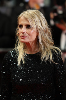 Isabella Ferrari (in custom Saint Laurent) attends the "Roma Elastica" screening during the 79th