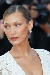 Bella Hadid (Schiaparelli dress by Daniel Roseberry) attends the "La Bataille De Gaulle: L'Âge De