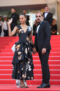 Zoe Saldaña (in Chanel) and Marco Perego attend the closing ceremony of the 79th annual Cannes Film
