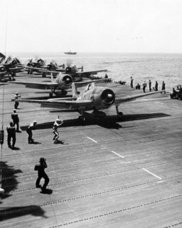 Grumman F6F-3 fighter on the deck of an American aircraft carrier